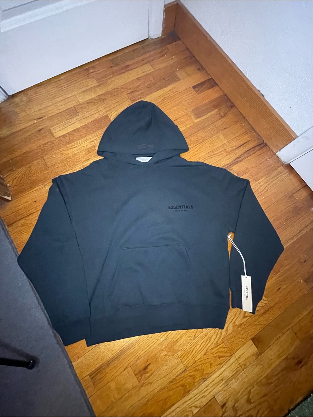 Essentials Black Pullover Hoodie with Subtle Logo